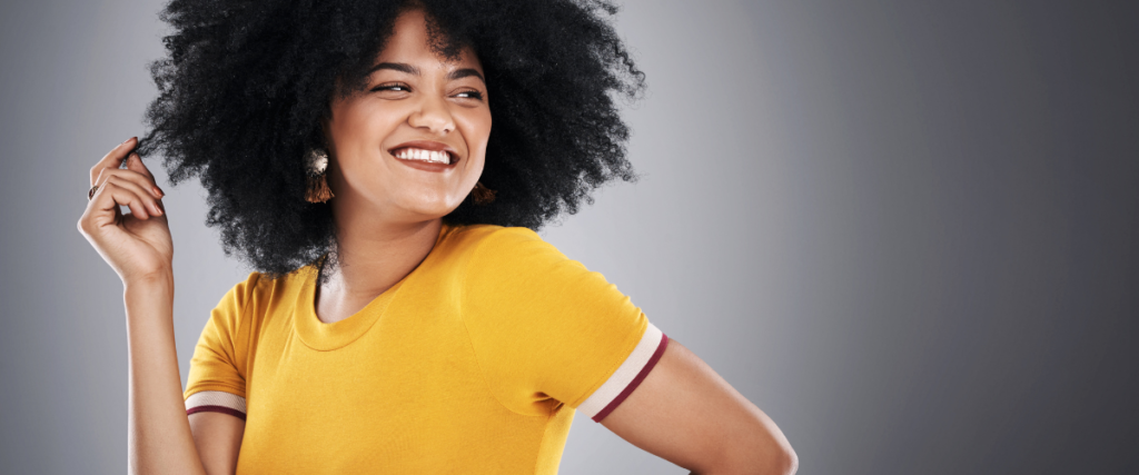 smiling autistic female entrepreneur to show that throwing away checklists brings joy