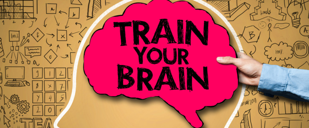 Picture shows the outline of a head with the words train your brain in a speech bubble inside.